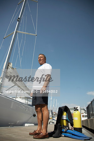 Man Standing on Dock