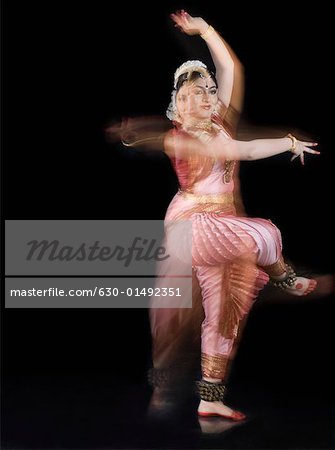 Young woman performing Bharatnatyam