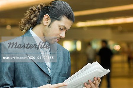 Close-up of a businessman reading documents