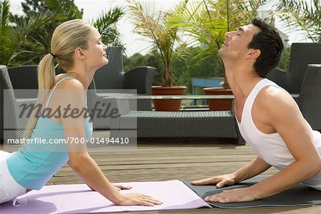 Couple Doing Yoga