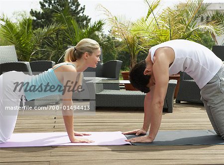 Couple Doing Yoga