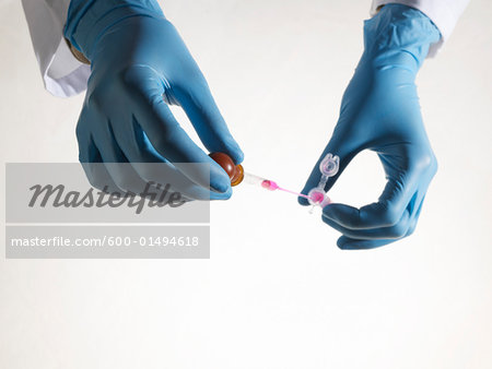 Hands Holding Test Tube Hands Holding Test Tube
