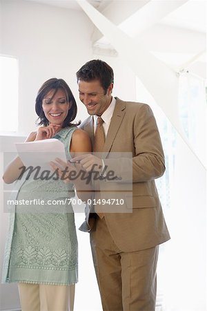 Business People Looking at Documents