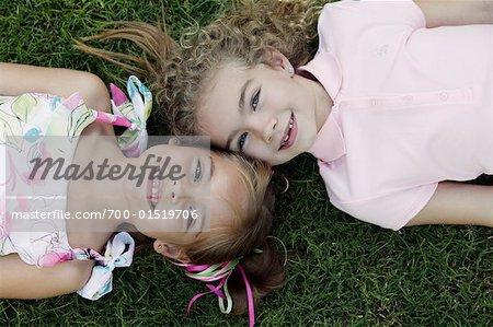 Girls Lying on Grass