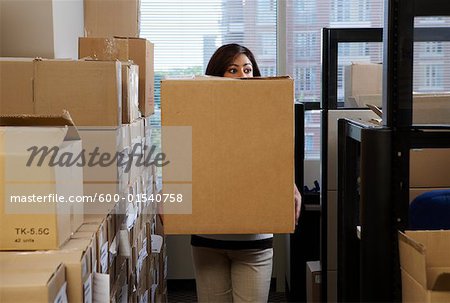 Woman Carrying Boxes