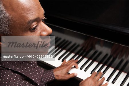 Man Playing Piano
