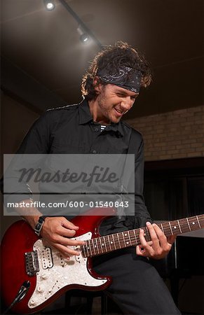 Man Playing Guitar