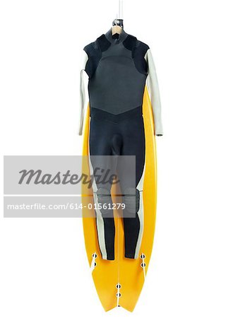 Wetsuit and surfboard