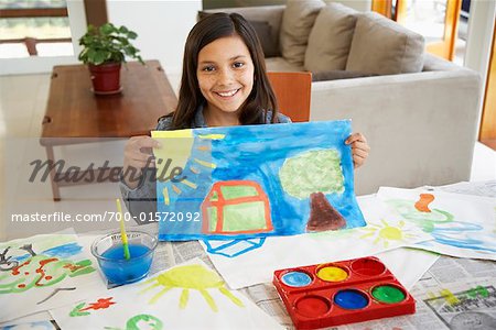 Girl Displaying Painting