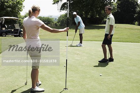 Golfers Putting