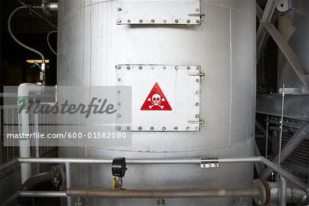 Danger Sign on Hatch in Water Treatment Plant