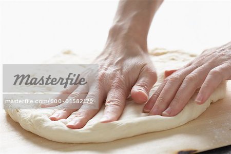 Hands Kneading Dough