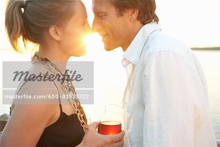 Couple Kissing at Sunset
