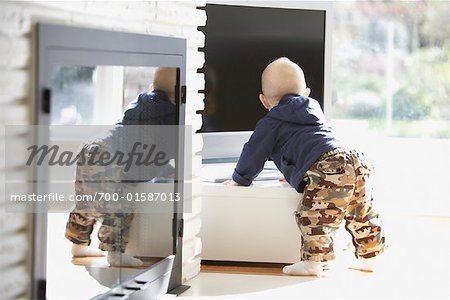 Baby Boy Looking at Television