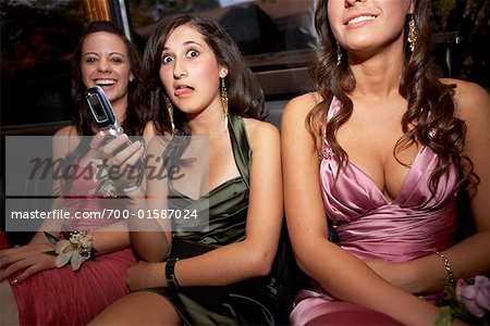 Girls in Limousine, Wearing Prom Dresses