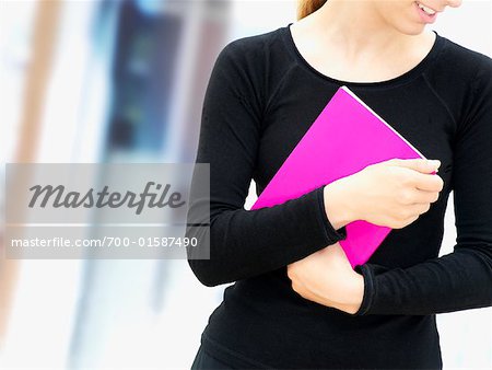 Woman Holding Colourful File Folder