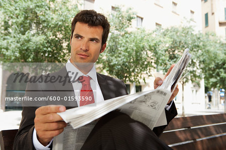 Businessman Reading Newspaper