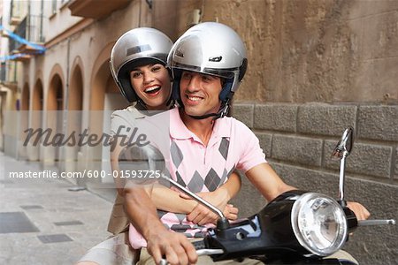 Couple d'équitation de vélomoteur