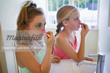 Girls Applying Clown Make-up