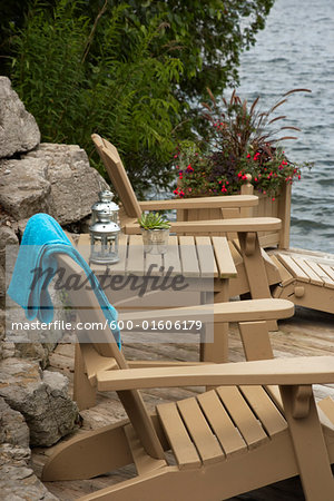 Wooden Chairs and Table by Shore