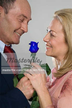 Man and Woman with Blue Rose
