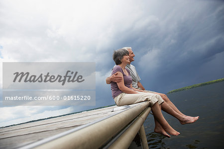 Couple Sitting on Dock