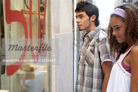Young Man and Woman Window Shopping