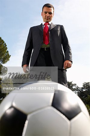 Businessman Playing Soccer