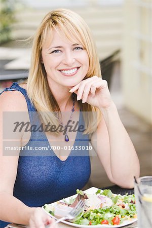 Portrait of Woman Eating Salad