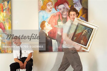 Man Stealing Painting from Art Gallery