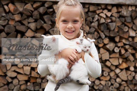 Girl Holding Kittens Girl Holding Kittens