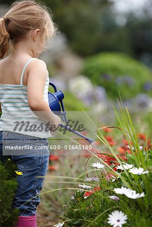 Girl Watering Garden