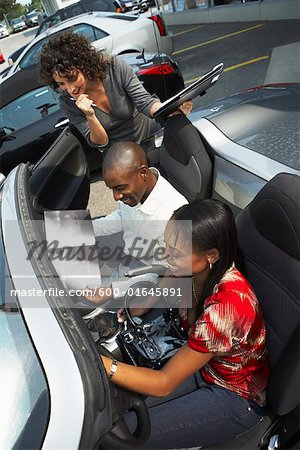 Couple Shopping For a New Car