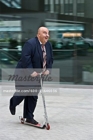 Businessman on Scooter