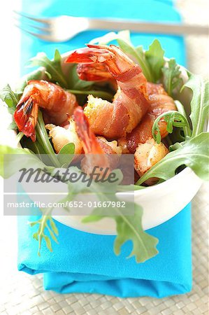 Roast Mediterranean prawns, smoked bacon and rocket lettuce