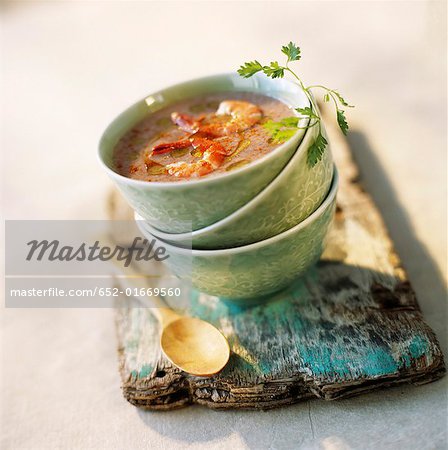 creamed red rice soup with lemon grass and grilled prawns