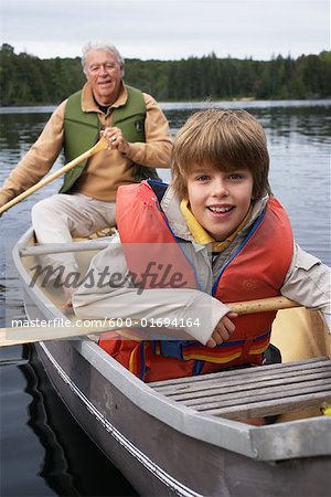 Man and Boy Canoeing