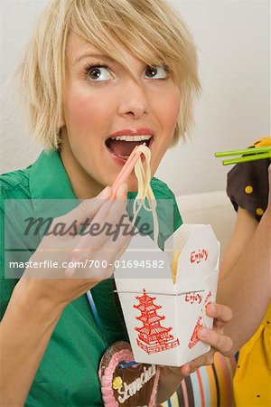 Woman Eating Chinese Food