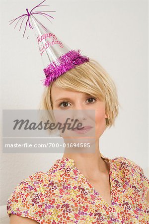 Woman Wearing Birthday Hat