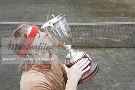 Portrait of Man Kissing Trophy