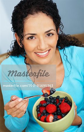 Woman Eating Berries