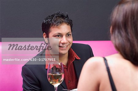 Young couple sitting in a restaurant