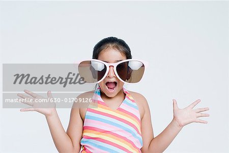 Close-up of a girl wearing sunglasses