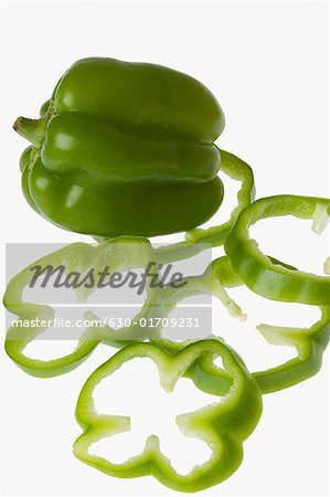 Close-up of a green bell pepper with slices