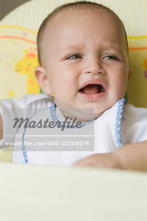 Close-up of a baby boy crying