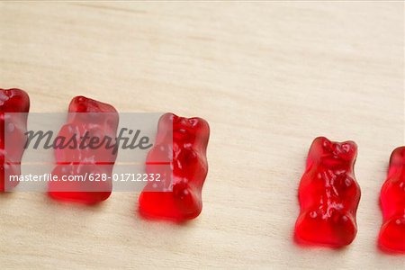 Red gummy bears in a row