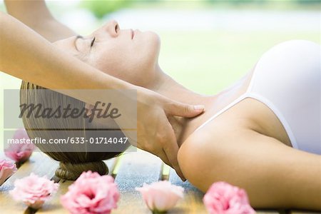 Woman having neck massage