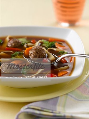 Bowl of Soup with Spoon