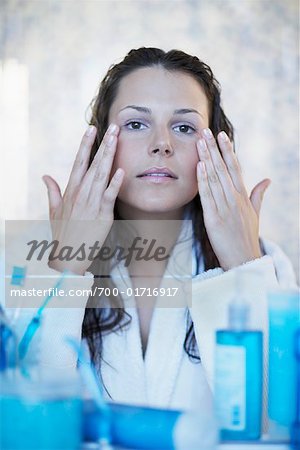 Woman Putting on Make-Up