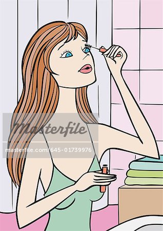 Woman applying mascara in bathroom